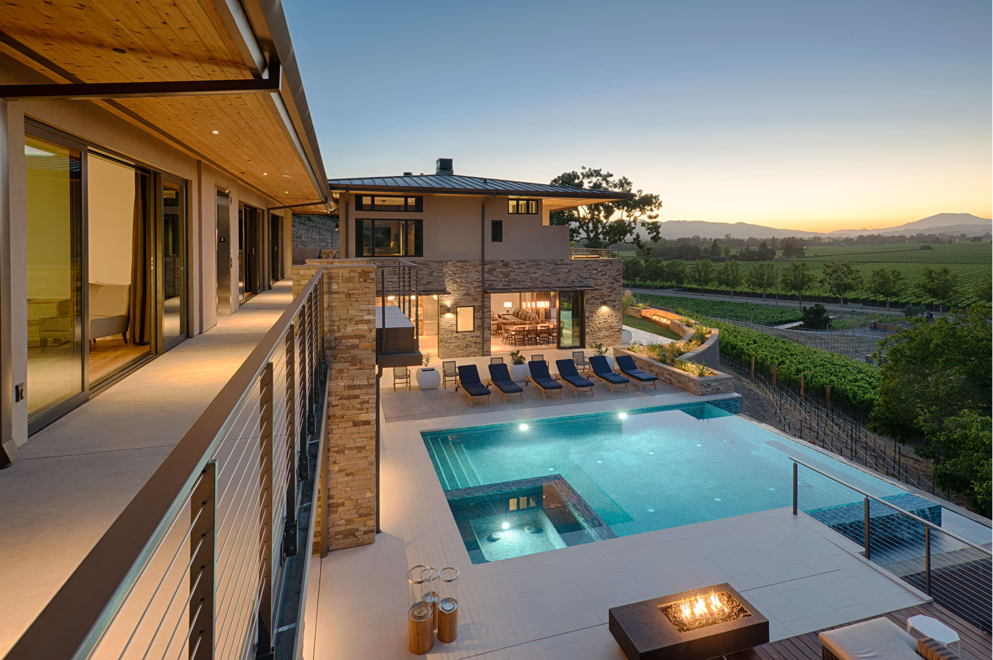 Deck on house overlooking vineyards at Oakville hillside residence